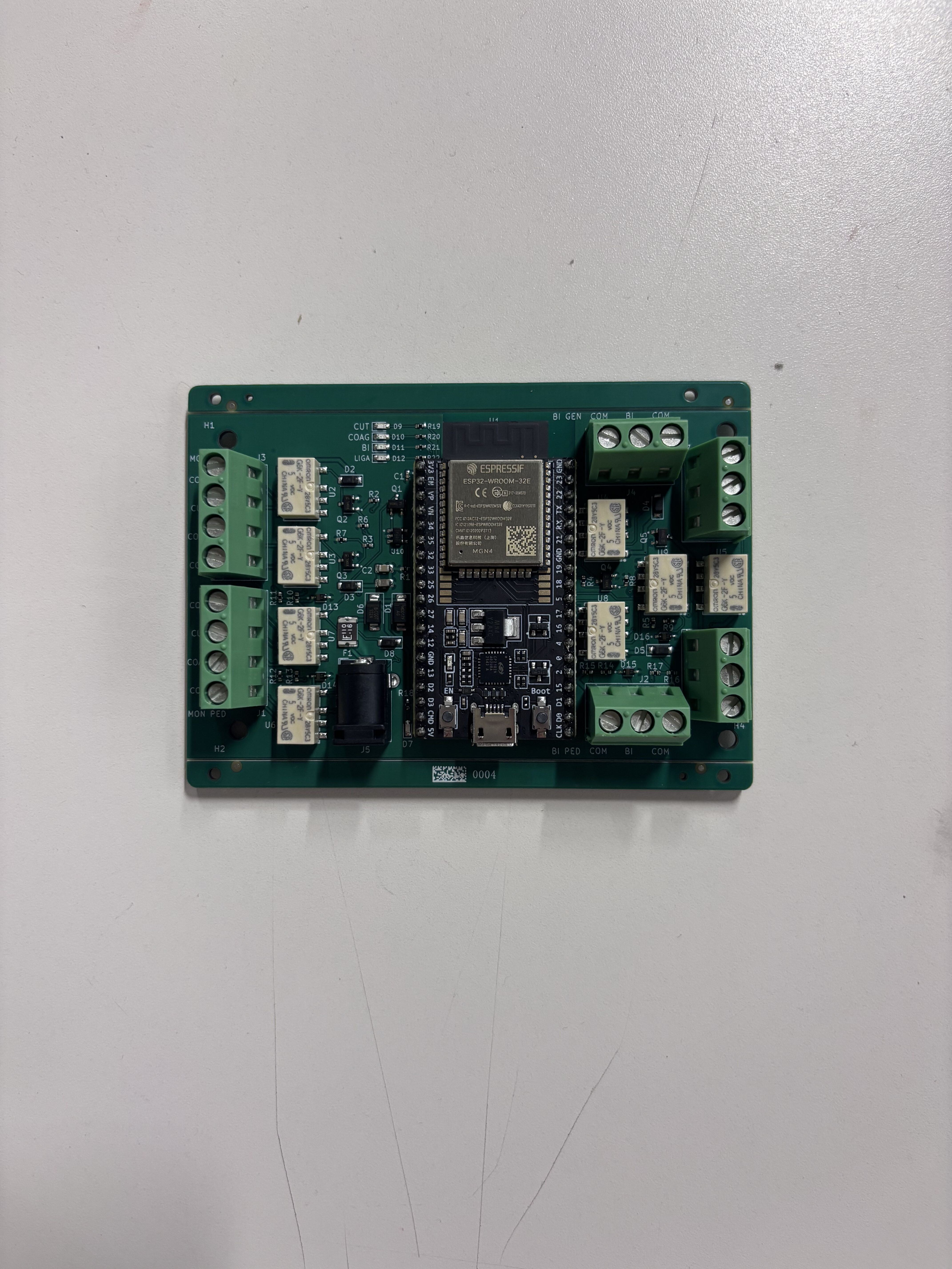 Assembled v3 surgical pedal interface with ESP32 and eight relays